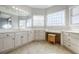 Vanity area with tile floors and ample counter space at 1018 Jubilee Way, Powder Springs, GA 30127