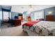Comfortable bedroom featuring a cozy window seat, desk, and large window for natural light at 1018 Jubilee Way, Powder Springs, GA 30127