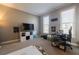 Bedroom featuring two windows, carpet, and neutral color palette with plenty of space for activities at 1018 Jubilee Way, Powder Springs, GA 30127