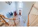 Entryway featuring high ceilings, a decorative window, and a staircase with carpeted steps at 1018 Jubilee Way, Powder Springs, GA 30127