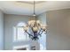 An ornate chandelier hangs above the front entrance at 1018 Jubilee Way, Powder Springs, GA 30127