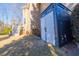 A large, outdoor storage shed on the side of the home for extra storage at 1018 Jubilee Way, Powder Springs, GA 30127