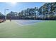 Well-maintained community tennis court with professional surfacing and fencing, ideal for recreational play at 1018 Jubilee Way, Powder Springs, GA 30127