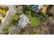 Aerial view of a home highlighting lush landscaping, a well-manicured lawn, and a beautiful roof at 2616 Boddie Pl, Duluth, GA 30097
