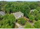 Aerial view of landscaped property surrounded by lush green trees at 2616 Boddie Pl, Duluth, GA 30097