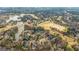 Aerial view of the house in a golf community near a lake and golf course at 2616 Boddie Pl, Duluth, GA 30097