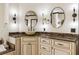 Modern bathroom with dual sinks, granite counters, and custom cabinetry at 2616 Boddie Pl, Duluth, GA 30097