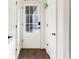Entryway with a glass-paneled door, dark hardware and a view to the outdoors at 2616 Boddie Pl, Duluth, GA 30097