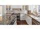 Beautiful kitchen with granite countertops, stainless steel appliances, and custom cabinetry at 2616 Boddie Pl, Duluth, GA 30097