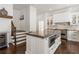 Gourmet kitchen with stone counters, stainless appliances and seating at the island at 2616 Boddie Pl, Duluth, GA 30097