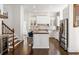 Gourmet kitchen with stainless steel appliances, granite countertops, and a large island at 2616 Boddie Pl, Duluth, GA 30097