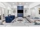 Bright living room with coffered ceilings, built-in shelving, and access to the outdoors at 2616 Boddie Pl, Duluth, GA 30097