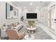 Cozy living room with bright natural light, stylish decor, and modern furnishings at 2616 Boddie Pl, Duluth, GA 30097