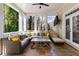 Relaxing porch showcasing comfortable seating area with plush cushions and tranquil views at 2616 Boddie Pl, Duluth, GA 30097