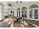 Outdoor porch area with seating and dining furniture for relaxing outdoors at 2616 Boddie Pl, Duluth, GA 30097