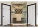 Spacious glass shower with marble tile, dual shower heads, and built-in seating at 2616 Boddie Pl, Duluth, GA 30097