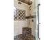Close-up of a tiled shower with marble accents, a built-in corner seat, and a glass door at 2616 Boddie Pl, Duluth, GA 30097