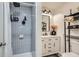 Updated bathroom features a tiled shower with modern fixtures and a vanity with storage at 2686 Oak Leaf Se Pl, Atlanta, GA 30316