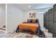 Basement bedroom with a sliding partition and warm decor at 2686 Oak Leaf Se Pl, Atlanta, GA 30316