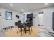 Eat-in kitchen with a round table set, modern cabinetry, and access to a full bathroom at 2686 Oak Leaf Se Pl, Atlanta, GA 30316