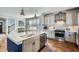 Bright kitchen features stainless appliances, granite countertops, and a cozy eat-in breakfast bar at 2686 Oak Leaf Se Pl, Atlanta, GA 30316