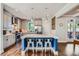 Open concept kitchen with stainless appliances, an eat in island, and modern finishes at 2686 Oak Leaf Se Pl, Atlanta, GA 30316
