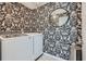 Well-lit laundry room with modern appliances and stylish wallpaper at 2686 Oak Leaf Se Pl, Atlanta, GA 30316