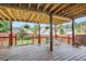 Relaxing outdoor deck with wooden decking, string lights, and comfortable seating at 2686 Oak Leaf Se Pl, Atlanta, GA 30316