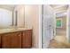 Bathroom vanity with ample storage, marble countertop, and bright lighting, perfect for your daily routine at 4616 Town Manor Dr, Douglasville, GA 30135