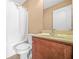 Bathroom featuring a shower with curtain and vanity with sink and traditional-style faucet at 4616 Town Manor Dr, Douglasville, GA 30135