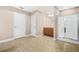 Spacious bathroom featuring a glass door shower, vanity with storage, and neutral tile flooring at 4616 Town Manor Dr, Douglasville, GA 30135