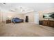 Large Primary bedroom suite with tray ceiling, ceiling fan, and plenty of natural light at 4616 Town Manor Dr, Douglasville, GA 30135