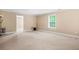 Spacious bedroom offering ample room for furniture, relaxation, and personalization, with easy access to other rooms at 4616 Town Manor Dr, Douglasville, GA 30135