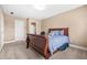 Bedroom with an ensuite bathroom and carpet at 4616 Town Manor Dr, Douglasville, GA 30135