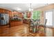 Eat-in kitchen with stainless steel appliances, an island, and wood cabinets at 4616 Town Manor Dr, Douglasville, GA 30135