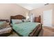 Relaxing main bedroom features neutral colors and a plush bed at 4616 Town Manor Dr, Douglasville, GA 30135