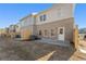 Exterior view of a townhome with a small yard and patio space surrounded by a new wooden fence at 4667 Larkfield Way, Powder Springs, GA 30127
