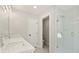 Modern bathroom with double sink vanity and glass shower at 4667 Larkfield Way, Powder Springs, GA 30127