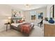 Comfortable bedroom with a queen-size bed and neutral decor at 4667 Larkfield Way, Powder Springs, GA 30127