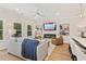 Open-concept living room featuring fireplace, recessed lights, wood flooring, and modern furniture at 4667 Larkfield Way, Powder Springs, GA 30127