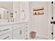 Elegant bathroom features a stone countertop vanity and stylish fixtures, offering comfort and style at 5335 Briarstone Ridge Way, Alpharetta, GA 30022