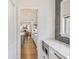 Bright kitchen featuring modern cabinets, stainless steel microwave, and elegant chevron backsplash at 5335 Briarstone Ridge Way, Alpharetta, GA 30022