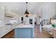 Spacious kitchen featuring a large island, modern appliances, and an open floor plan at 5335 Briarstone Ridge Way, Alpharetta, GA 30022
