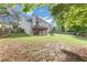 Enjoy this spacious backyard with a well-maintained lawn, a deck, and a play area, great for outdoor activities at 566 Vintage Pointe Run, Mableton, GA 30126
