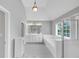 Bright bathroom featuring double vanity, soaking tub, and glass enclosed shower at 566 Vintage Pointe Run, Mableton, GA 30126
