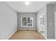 Bedroom featuring neutral walls and carpet and a window with blinds at 566 Vintage Pointe Run, Mableton, GA 30126