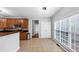 Kitchen next to breakfast area with stainless steel appliances and tile flooring at 566 Vintage Pointe Run, Mableton, GA 30126
