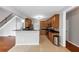 Open kitchen with granite counters and stainless appliances connects seamlessly to other rooms at 566 Vintage Pointe Run, Mableton, GA 30126