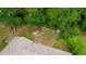 Aerial view of the backyard with mature trees at 1520 Oxford St, Douglasville, GA 30134