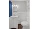 Bathroom with white vanity and white fixtures at 1520 Oxford St, Douglasville, GA 30134
